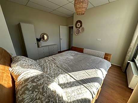 One-Bedroom Apartment with Balcony and City View