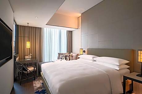 Deluxe Guest Room with King Bed and Sofa