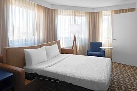 One- Bedroom Corner King Suite with Sofa Bed