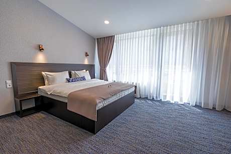 Double Room with Balcony (2 Adults + 1 Child)