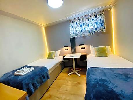 Standard Twin Room with Shared Bathroom