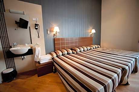 Double Room with Two extra beds and Shared Bathroom