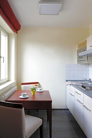 Superior Double Room with Kitchen and extra armchairs Bed