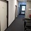 BUSINESS-MOTEL free WiFi & massage, air-con, XXL-Parking