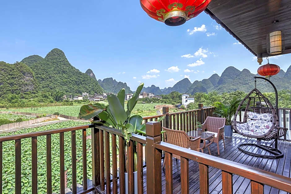 Yangshuo Tea Cozy-Free one way pick up service over 4 nights, English speaking, Yulong river location,Laundry service,Swimming pool, Bicycle rent