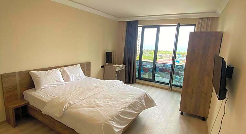 Rena Grand Residence & Suit