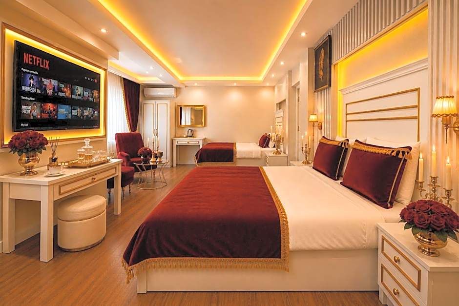 Photo 1 of 6 of Deluxe Triple Room with Sea View