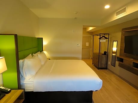1 king bed, mobility accessible room, roll-in shower, non-smoking