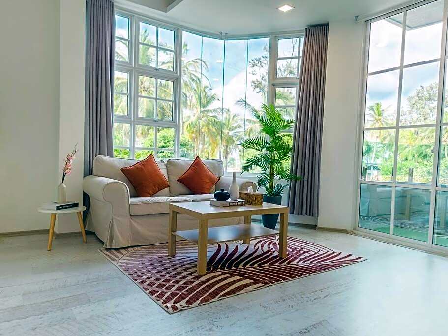 Cozy 1BR apartment by beach - partial ocean view