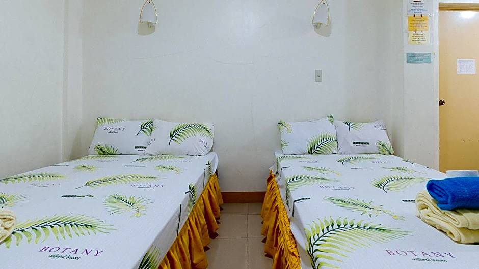 Golden Sunrise Hotel II by RedDoorz