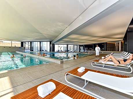 Room with 1 large bed, 1 sofa bed and countryside view