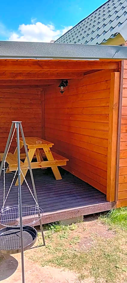 Domki i pokoje ,,Pod Palmami" w centrum