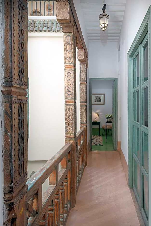Riad Le J