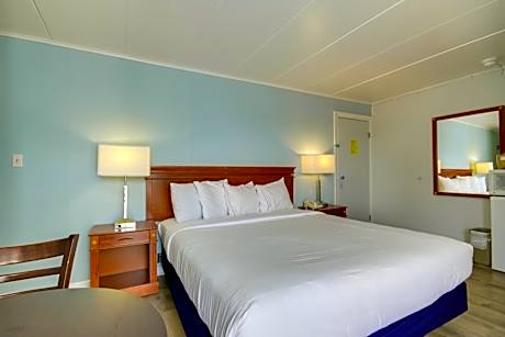 King Room with One King Bed and Balcony with Pool View