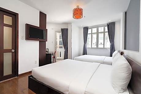 Family Room with Balcony and City View