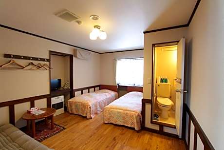 Twin Room with Private Bathroom and Sofa Bed