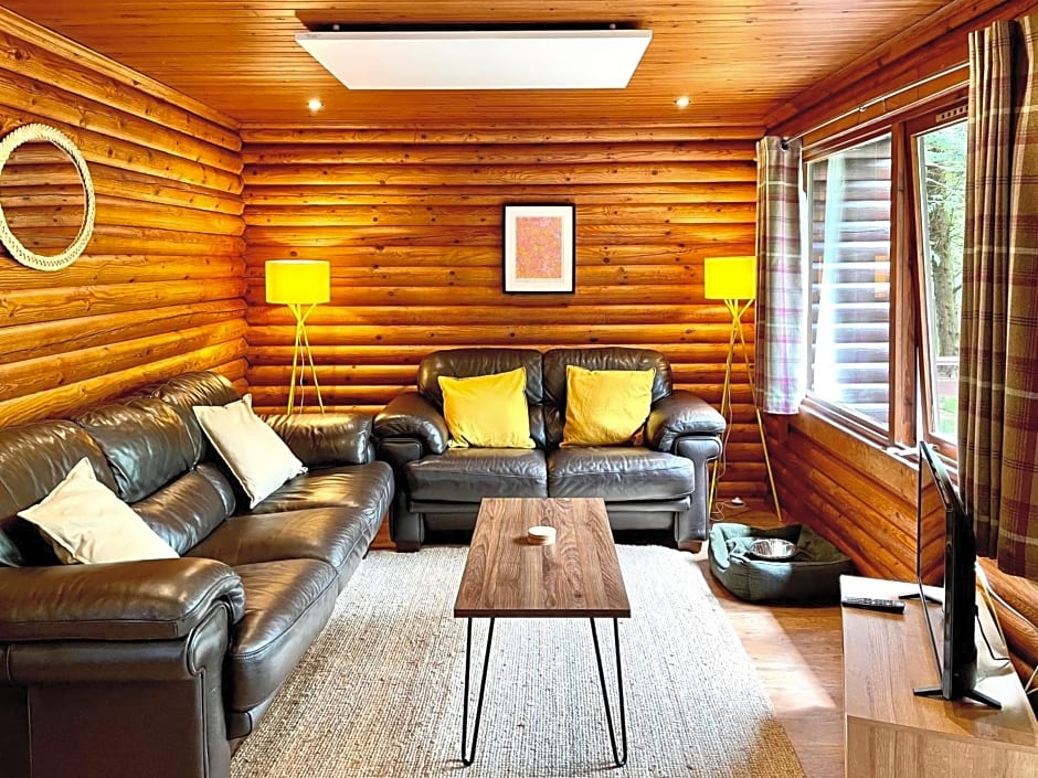 Riverside log cabins