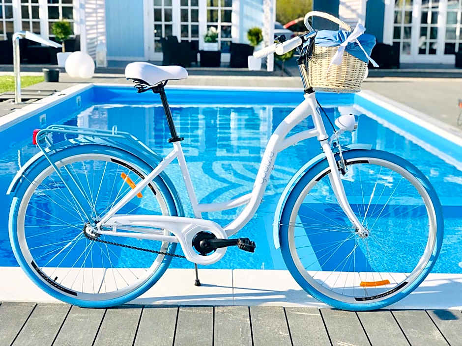 Domki BALTIC FAMILY basen kidsclub rowery