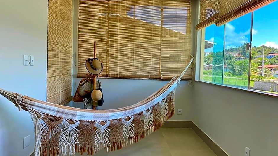 Refúgio Pé na Areia com 4 quartos em Ilhéus - Condomínio Perfeito para Família!