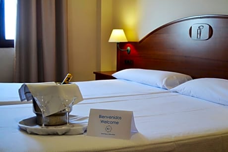 Triple Room (2 Adults + 1 Child)