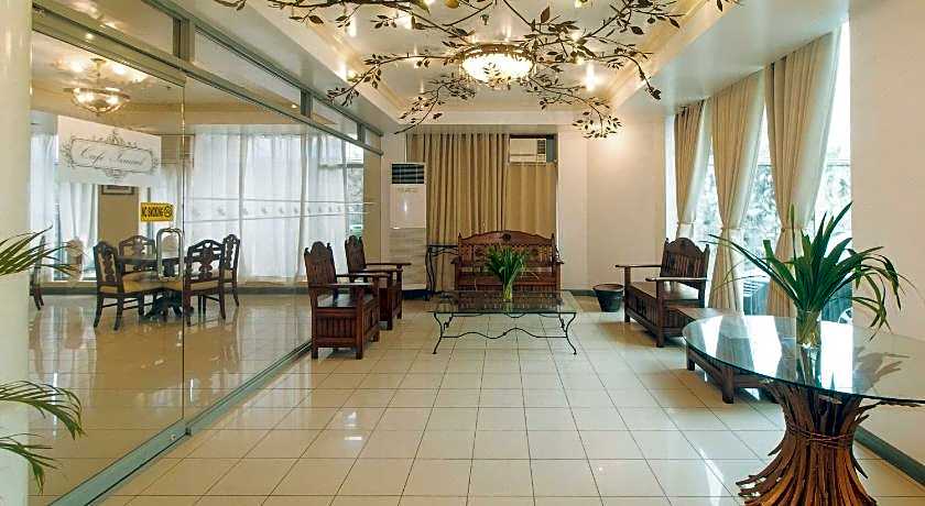 Royal Am Rei Hotel by RedDoorz