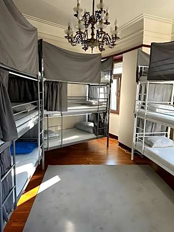 Single Bed in Dormitory with Shared Bathroom