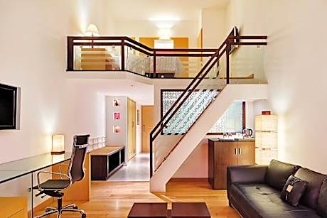 Duplex Suite, Club level, 1 Bedroom Bi-level Suite, 1 King, City view, Balcony with 10% F & B discount