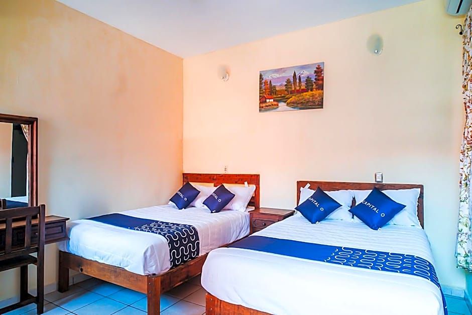 Capital O Hotel Aurora