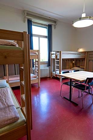 Single Bed in Dormitory Room