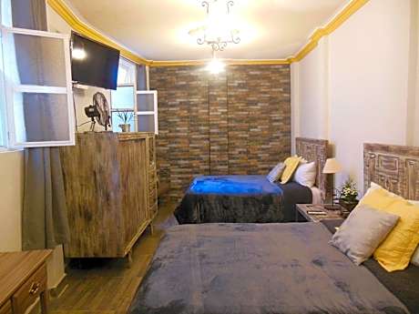 Quadruple Room with Private Bathroom