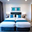 Essence Suites Taringa