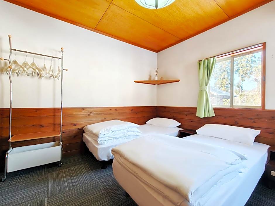Photo 1 of 6 of Economy Triple Room with Shared Bathroom