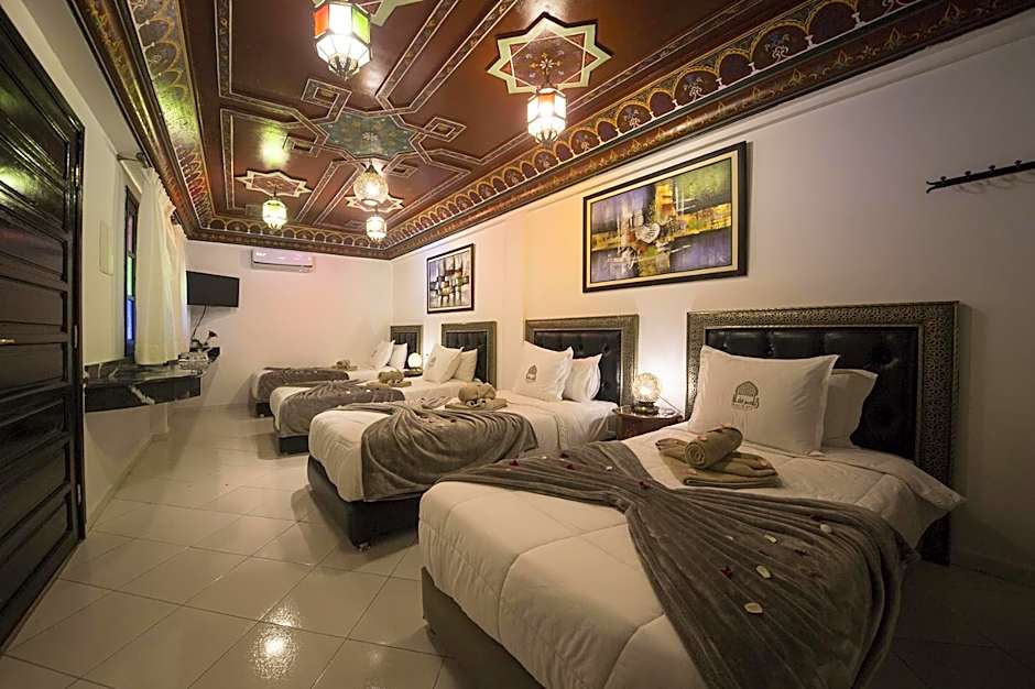 Photo 1 of 10 of Quadruple Room