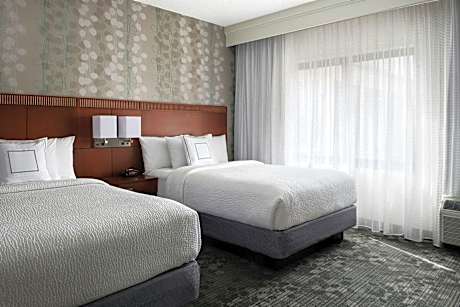 One-Bedroom Double Suite with Two Double Beds, Courtyard View and Sofa Bed