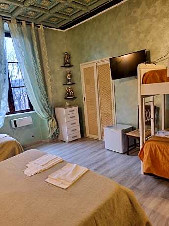 Quadruple Room with Private Bathroom