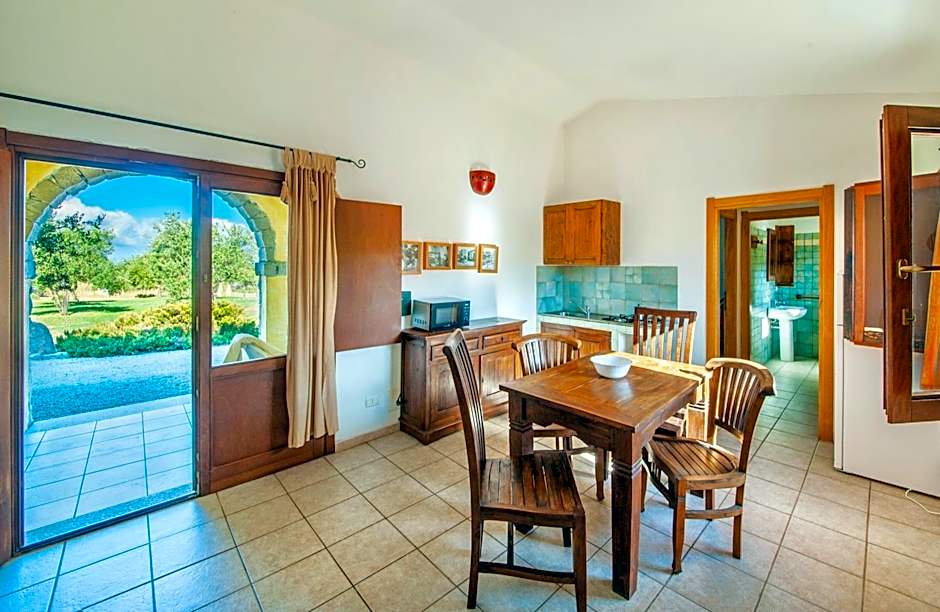 Residence with swimming-pool in Badesi, apartments with private outdoor area