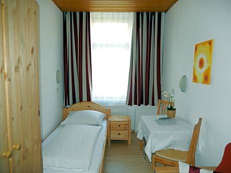 Single Room with Shared Bathroom and Toilet