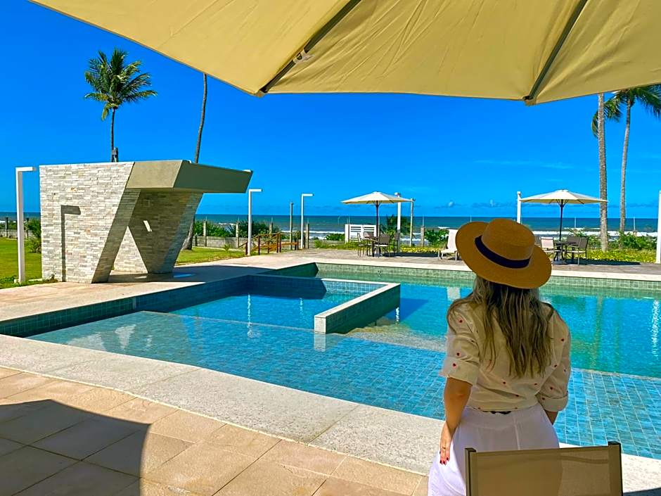 Refúgio Pé na Areia com 4 quartos em Ilhéus - Condomínio Perfeito para Família!