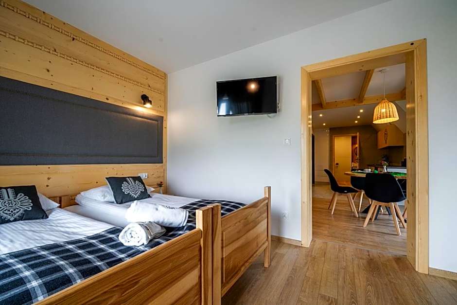 Aparthotel Rabiań-SKI 10metrów do wyciagu połączonego z całą Kotelnicą na miejscu wypoożyczalnia z serwisem