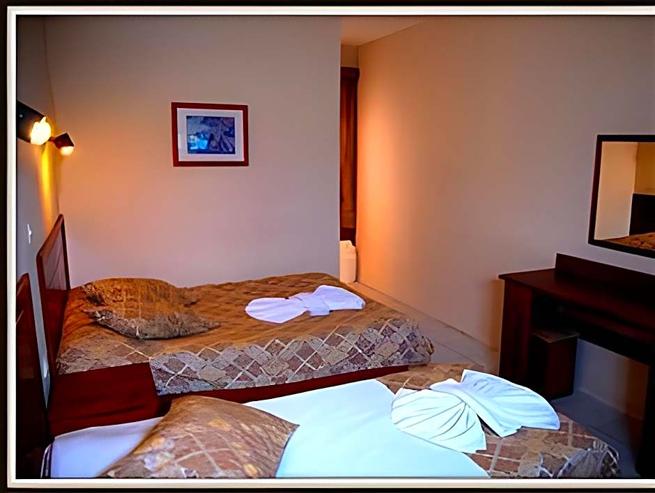 Photo 1 of 6 of Triple Room