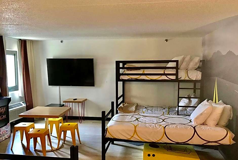 Photo 1 of 2 of King Room with Three Bunk Beds - Non-Smoking
