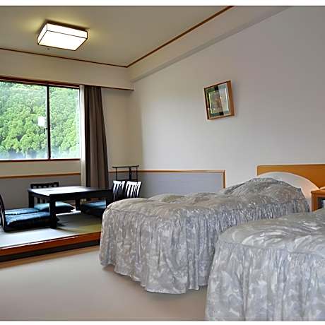 Main building [Japanese-Western room with 2 beds + 6 tatami mats] or [1 tatami Japanese room]
