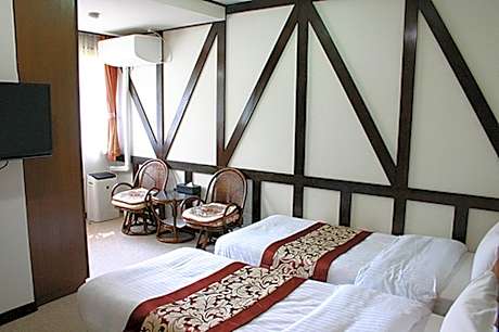 Twin Room with 2 Single Beds and Shared Bathroom