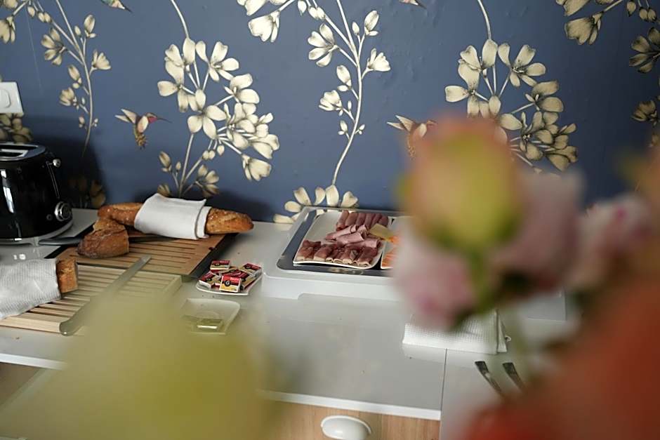 Hôtel Échappée en Baie - Parking privé gratuit dont forfaits bornes électriques réservable