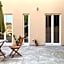 ClickSardinia Alghero Spectacular waterfront Neptune apartment with sea-facing terraces and garden