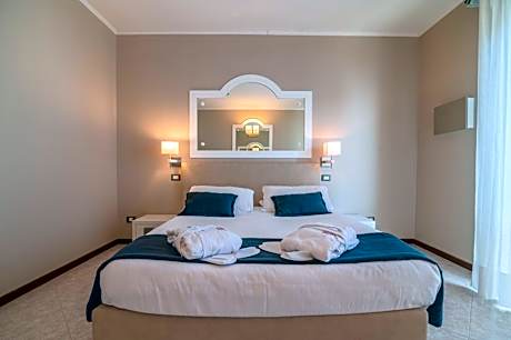 Comfort Quadruple Room with Balcony and Lateral Sea View