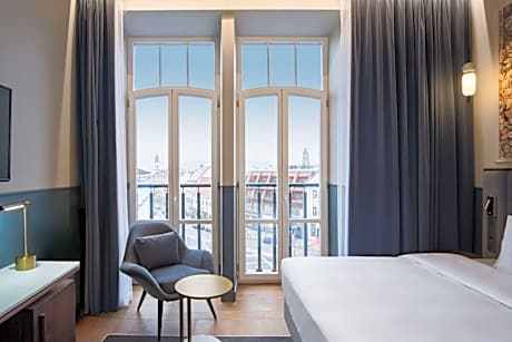 Collection Room with Balcony and Old Town View