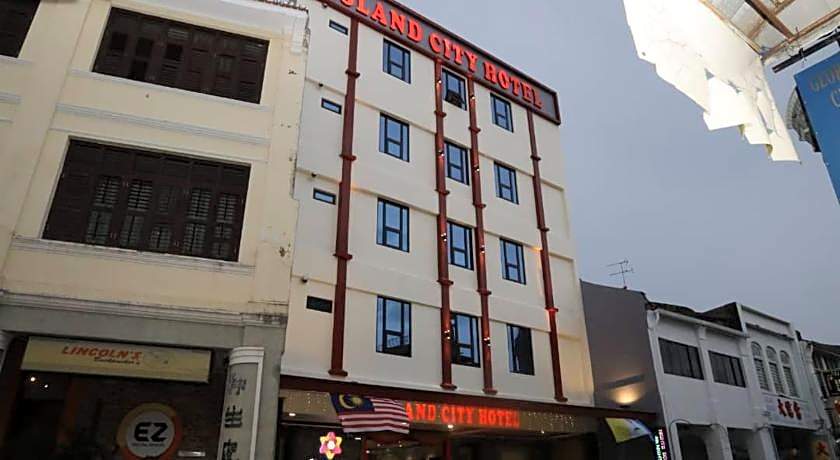 Capital O 90897 Island City Hotel