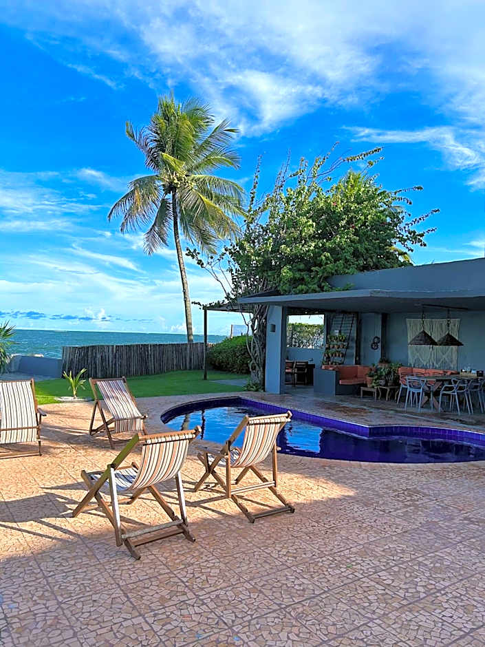 Casa Ilha| beira mar, piscina aquecida, 4 suítes