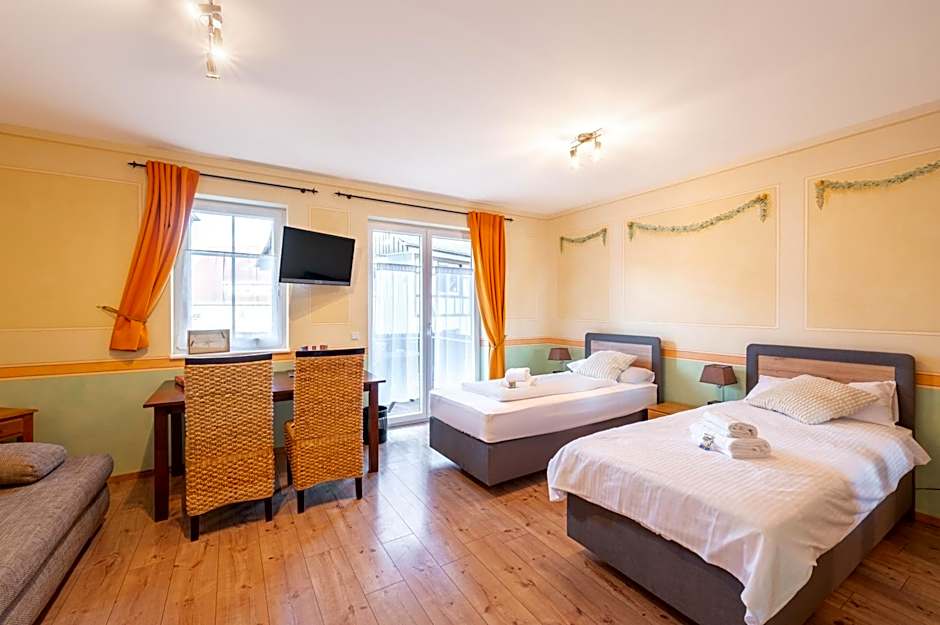 SCHUSTERjunge Aparthotel I Zentral I Studio Apartments I Küche & Bad I Parkplatz